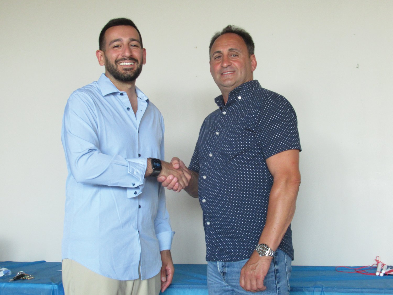 WARM WELCOME: Joseph Polisena Jr., Vice-President of Johnston Town Council, congratulates Stephen Mandarelli upon being unanimously elected to the Johnston Democratic Town Committee (JDTC).